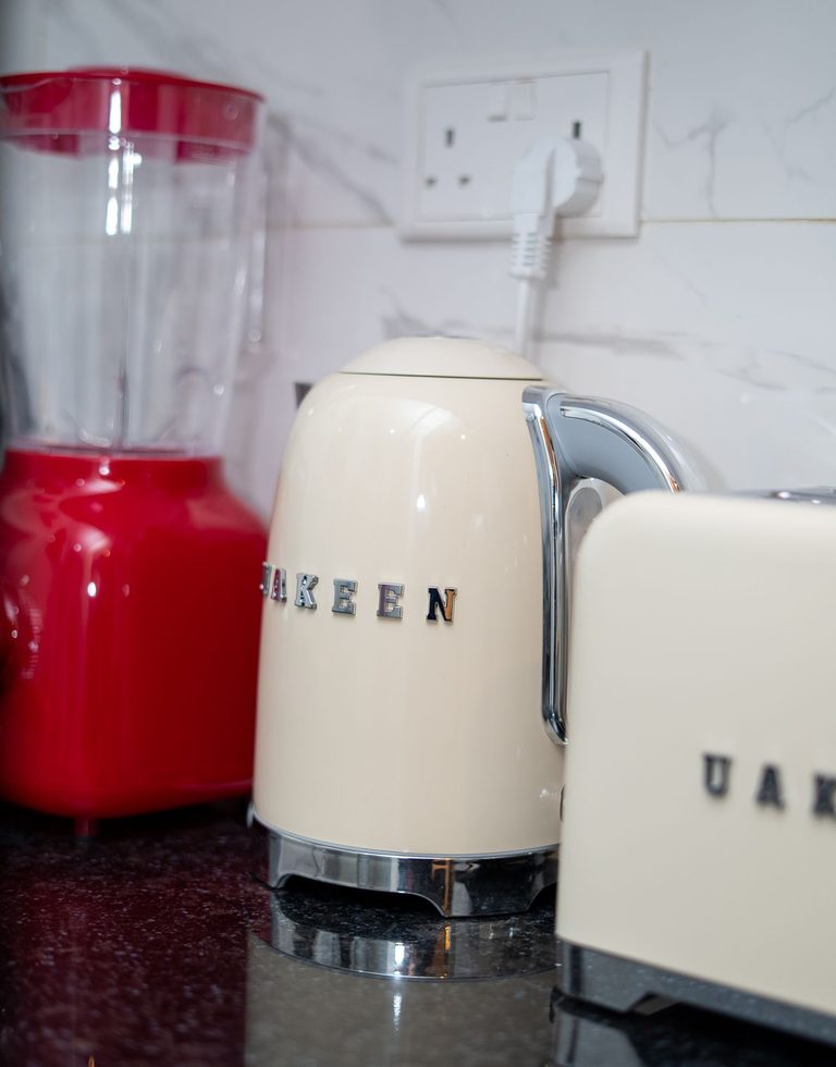 kitchen counter with a blender and kettle, The Emerald, Garden City