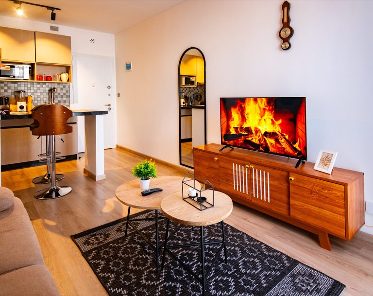 TV with fireplace display, mirror and water dispenser, The Hearth, Tatu City