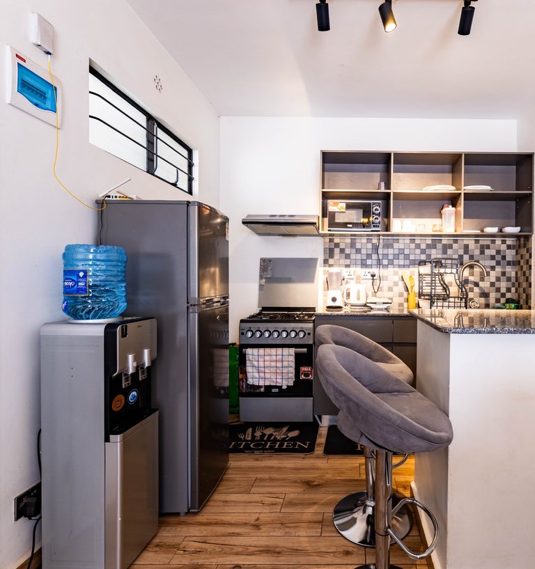 Kitchen entrance with the water dispenser and refrigerator, The Velvet, Tatu City