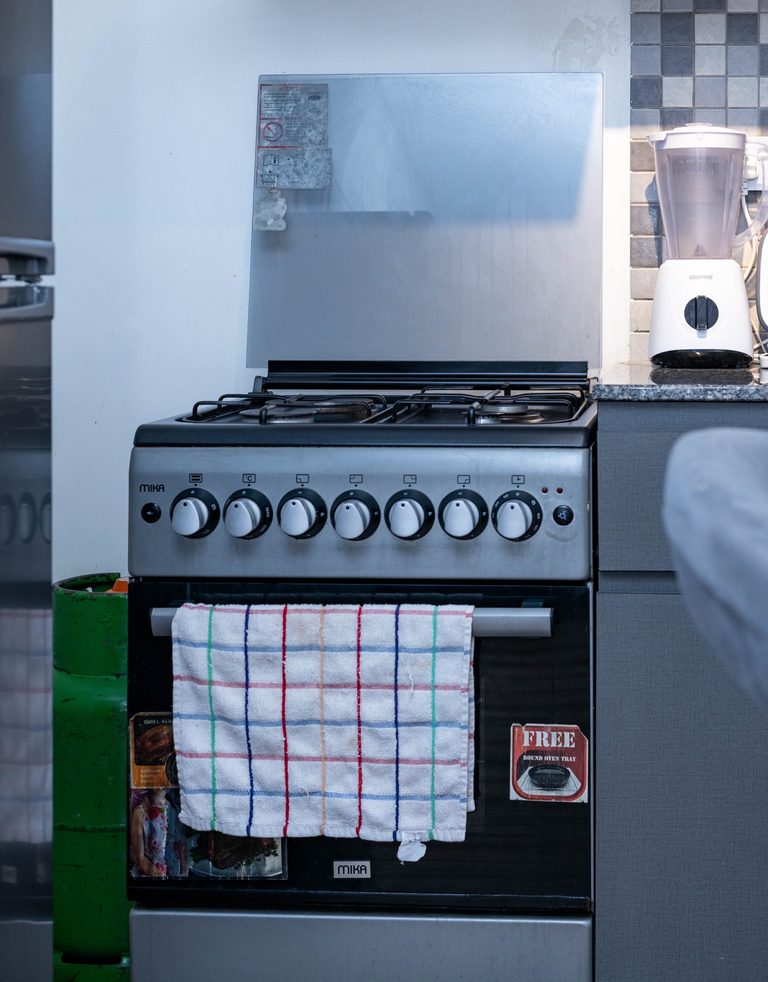 Stainless gas cooker and oven with a glass splash guard, The Velvet, Tatu City